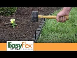 No matter what you choose, you'll need to decide on a perimeter and dig a trench for the edging to go into. Easyflex No Dig Edging Improvements Catalog Youtube