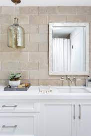 These framed pieces are the perfect beige bathroom accessories to pair with beige walls and wainscoting. Cream Bathroom Cabinets Design Ideas