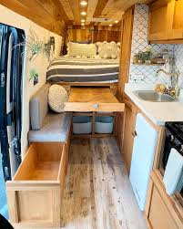 How Awesome Is All This Extra Storage In This Converted Van We Would Love To Take This Across The Country Tiny House Storage Tiny House Living Van Interior