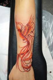 This design depicts the phoenix rising from the phoenix tattoo on the left upper arm. Phoenix On My Left Arm Bird Tattoos Arm Phoenix Bird Tattoos Phoenix Tattoo