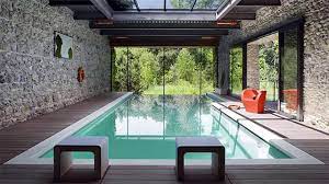 If you want to go all the way with your enclosure and make it a part of your home, check out our indoor swimming pool guides for tons of details on the costs. Indoor Swimming Pool Design Idea Decorating Your Home Youtube