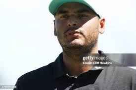 Golf CEO, Greg Norman greets Toby McSwain during Day Two of the LIV... News  Photo