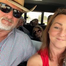 How to safely relocate a honey bee swarm in Conroe?