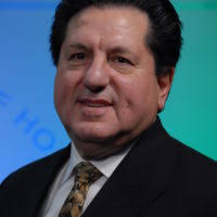 Nori Jackson, right, family readiness officer, announces