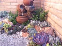 Looking for succulent ideas for your garden? Add Some Succulents And Cactus To The Back Corner And Change The Edging Succulent Garden Design Succulent Rock Garden Rock Garden Design