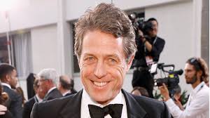 Hugh Grant Talks Golden Globes Criticism: 'Twitter Said I Was Aging Like  Mayonnaise'