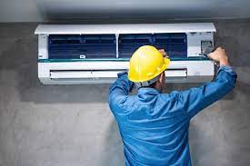 The primary function is to pull in the room's air, condition it to your set temperature by extracting the heat, and releasing the cooled air back into your room. Premium Photo The Worker Is Preparing To Install The Air Conditioner
