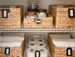 If you can store them all together idea to use shelf dividers (click the link to read an article about these organizers), especially for stacks of smaller items such as wash cloths and hand towels. An Amazing Master Bath Linen Closet Transformation Our Perfecting Manor