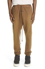 The pants sit slightly below the waist and have a hook and eye closure that provides a smooth clean front. Men S Brown Joggers Sweatpants