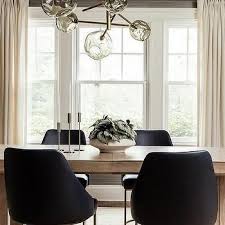 Light Brown Chunky Wood Dining Table With Black Rectangular Lantern Transitional Dining Ro In 2020 Black Leather Dining Chairs Brown Dining Room Brown Dining Table