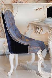 Furnish your dining room with a blue dining chair. Casa Padrino Luxury Baroque Dining Chair Blue Dark Blue Bronze Gold Handcrafted Solid Wood Kitchen Chair Dining Room Furniture In Baroque Style