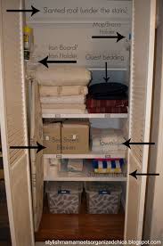 Divided shelves and a combination of shallow baskets, bins, and photo organizers help the space stay organized. Pin By Marilyn Moreno Hernandez On Organize 101 Store This Shared Board Closet Under Stairs Under Stairs Cupboard Under Stairs Closet