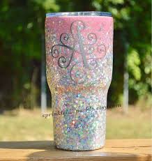 The angle will encourage the glitter to fall further down the surface. Glitter Yeti Glitter Dipped Tumbler Glitter Ozark Glitter Yeti Cup Designs Custom Tumbler Cups Glitter Tumbler Cups