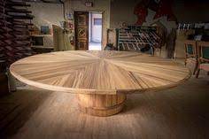 A circular dining table that expands when rotated. 48 Best Expanding Round Table Ideas Expanding Round Table Expandable Table Round Table