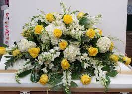 Yellow And White Rememberance Casket Spray In Bolivar Mo The Flower Patch More
