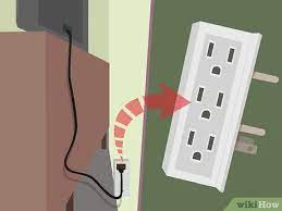 A hole saw bit attached to your power drill, drill a hole into the back panel of the desk drawer located near a wall outlet. How To Hide An Electrical Cord 9 Steps With Pictures Wikihow
