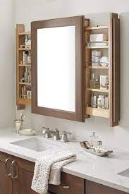 The bathroom blends modern showering area with a whole cabinet style that really looks comprehensive and strong. Bathroom Storage Ideas Modern Cabinets With Sliding Shelves And Drawers