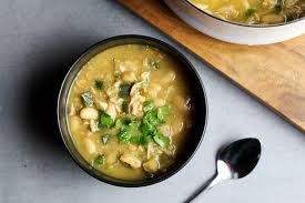 White bean chicken chili recipe simmered in a crockpot with whole roasted jalapenos, tender beans, corn, and lean chicken breast. Almost Award Winning White Chicken Chili Worthy Pause