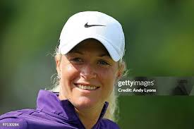 Vicky Hurst of the USA waves to the crowd