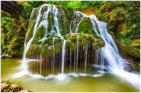 The small streams running on moss and soft grass that miraculously grows on rock create a unique scene you will never forget! Bigar Waterfall In Caras Severin Romania Facts Location Legend