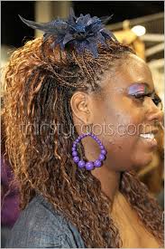 The color of the hair is very compatible with the skin color of the woman. Micro Braids Wet And Wavy
