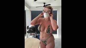 Influencer Lucy Adler with big titties doing woodwork in a bikini