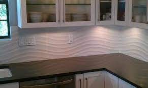 The backsplash panels can be cut with a snip, scissors or utility knife for quick and easy installation. Retro White Tile Backsplash Kitchen Backsplash Wave Panel Tile Contemporary Contemporary Backsplash Backsplash With Dark Cabinets Farmhouse Backsplash