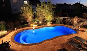 Riviera Fiberglass Pool By Leisure 401 438 7665 Fiberglass Swimming Pools Pool At Night Fiberglass Pools