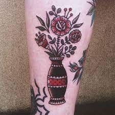 Traditional Vase With Flowers Tattoo On The Calf Traditional Flower Vase Tattoo Vase Tattoo Flower Vase Tattoo
