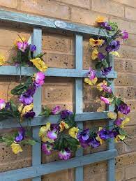 Professionally designed yellow flowers for london & uk delivery. Artificial Pansy Garland Purple And Yellow Pansies Shelf Edge Uk