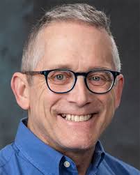 Dr. Michael Kugler, professor of history at Northwestern College, has been  named the 2025 recipient of the college's Faculty Excellence in Faith and  Learning Award. He was recognized during commencement exercises on