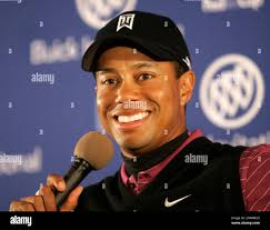 Tiger Woods sports a big smile as he talks about his bogey free round  following the third round of the Buick Invitational golf tournament  Saturday Jan. 26, 2008 in San Diego. Woods