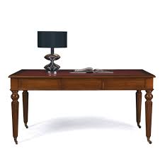 Tarver unifies bold design, industrial beauty, and the natural characteristics of wood and steel. Classic Executive Office Table