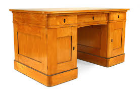 This standing desk is a modern version of a traditional writing desk. Swedish Biedermeier Birch Kneehole Desk
