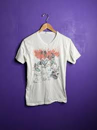 The captivating allure of Paul Harnden's GAULTIER T-shirt