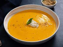 This Chilled Carrot Soup Is Smooth And Creamy Even Though It Has No Dairy In The Soup Base Fresh Mint Adds A Bright Carrot Soup Yogurt Recipes Serious Eats