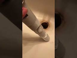 remove a stuck sink stopper (not a full