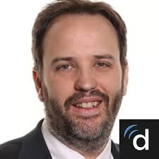 Dr. Justin F. Gainor, MD