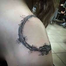 Discover the ancient symbol of a snake or dragon eating its own tail with the best ouroboros tattoo designs for men. What Is The Meaning Of An Ouroboros Tattoo Architecture Design Competitions Aggregator