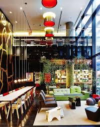 Bright Hotel With Spacious Communal Lobby In Times Square Affordable Interior Design Hotels Design Times Square New York