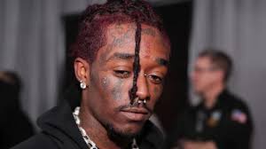 Lil uzi vert spent a whopping $24million for the natural pink diamond that is implanted in his forehead, according to the new york post. Lil Uzi Vert S 54 Tattoos Their Meanings Body Art Guru