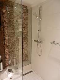 A lot of people like the look of exposed brick walls. Brick Wall In The Bathroom Is It Good Idea Wetrooms Design Ltd Wetrooms Design