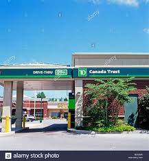 In addition to in branch hours we offer drive up teller service during branch operating hours as well as 24 hour online banking, drive thru atm and night deposit drop. Drive Thru Bank Drive Through Bank Drive Up Atm Customer Car At Td Canada Trust Toronto Dominion Canadian Bank Ontario Canada Kathy Dewitt Stock Photo Alamy