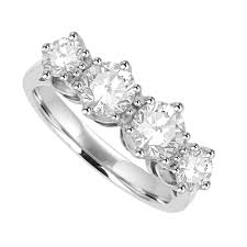 Maybe you would like to learn more about one of these? Platinum 4 Stone Diamond Eternity Ring