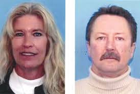 Authorities arrest ex-wife in 2002 slayings