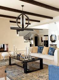 These not only work perfectly in smaller rooms, but they also give you the perfect spot for table lamps , decorative pieces or even a remote control. Bold And Glamorous How To Style Around A Black Coffee Table