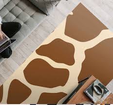 Any faux cowhide rug runner can be used throughout your home if you care for it properly. Brown Cow Skin Animal Print Vinyl Rug Tenstickers