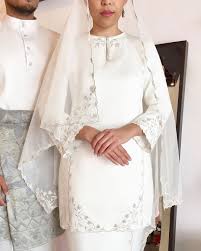 تونكو حاجة عزيزة أمينة ميمونة إسكندرية بنت المرحوم المتوكل على. 2 418 Likes 41 Comments Classic Contemporary Urban Zachrinjaafars Official On Instagram Our Signa Nikah Outfit Minimal Wedding Dress Bridal Outfits