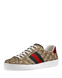 Beige and brown logo print on the back laminated prints reptile effect details web insert white laces supplied rubber sole composition: Gucci Men S Ace Gg Supreme Bees Leather Lace Up Sneakers Bloomingdale S