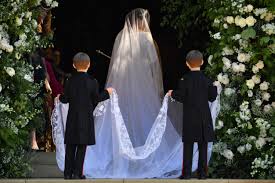 The wedding dress worn by meghan markle at her wedding to prince harry on 19 may 2018 was designed by the british fashion designer clare waight keller, artistic director of the fashion house givenchy. In India Not Everybody Was A Fan Of The Flowers On Meghan Markle S Wedding Veil Goats And Soda Npr